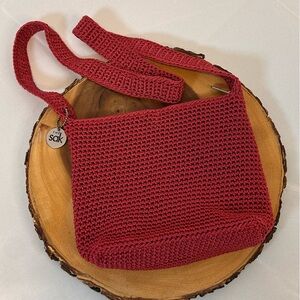 The SAK Vintage Shoulder Purse Strawberry Color zip top pockets inside and out